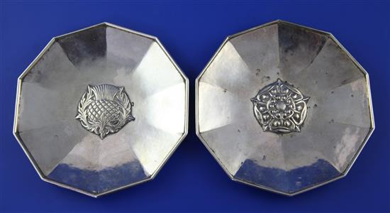 A pair of 1930s Omar Ramsden silver Thistle and Rose shallow dishes, 12.5 oz.